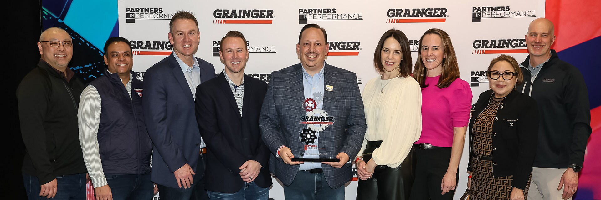 Team photo with Grainger’s Supplier of the Year award