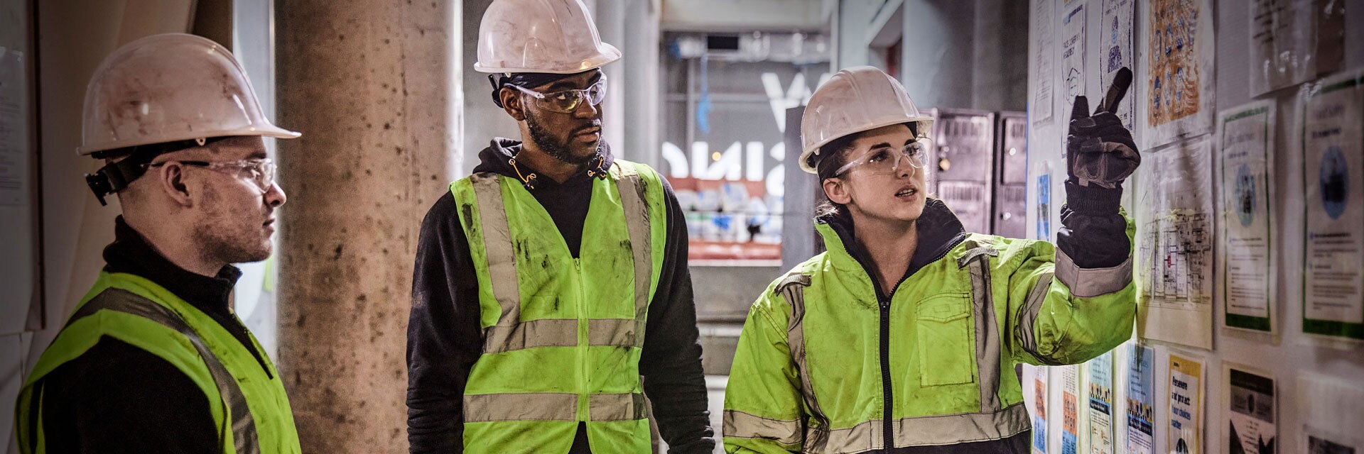Three workers at a jobsite